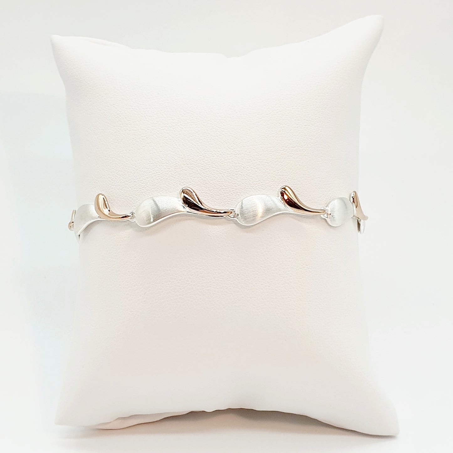 Elegant Sterling Silver Bracelet with Rose Gold Accents